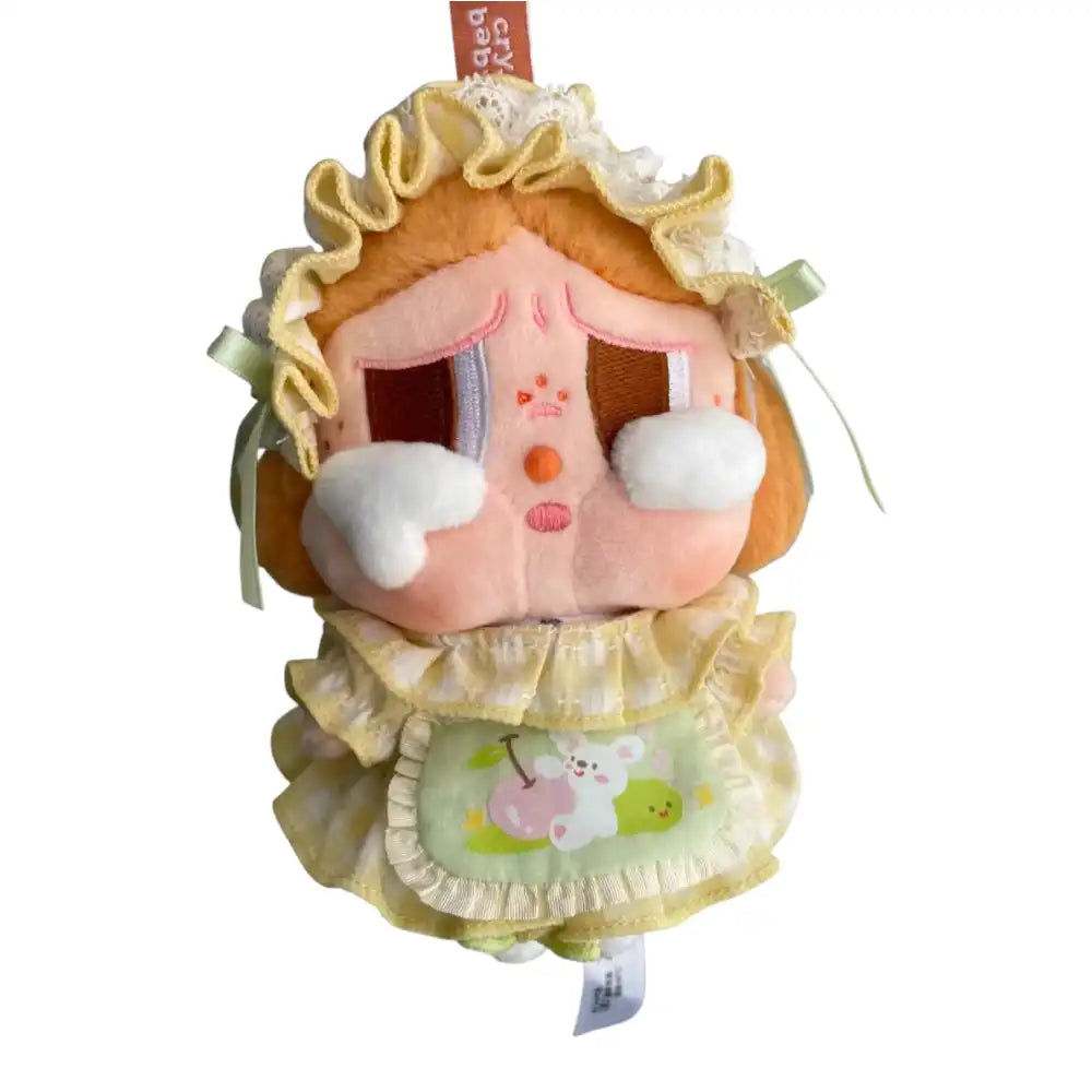 Crybaby figure wearing a complete Green Maid Outfit, including a green maid-style dress and a matching bonnet.