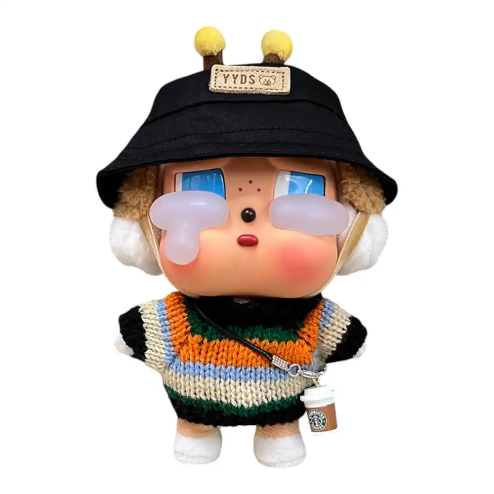 Crybaby figure wearing a 3-piece Black Sweater Outfit, including a black fisherman's hat, black and orange sweater, and a coffee cup accessory.