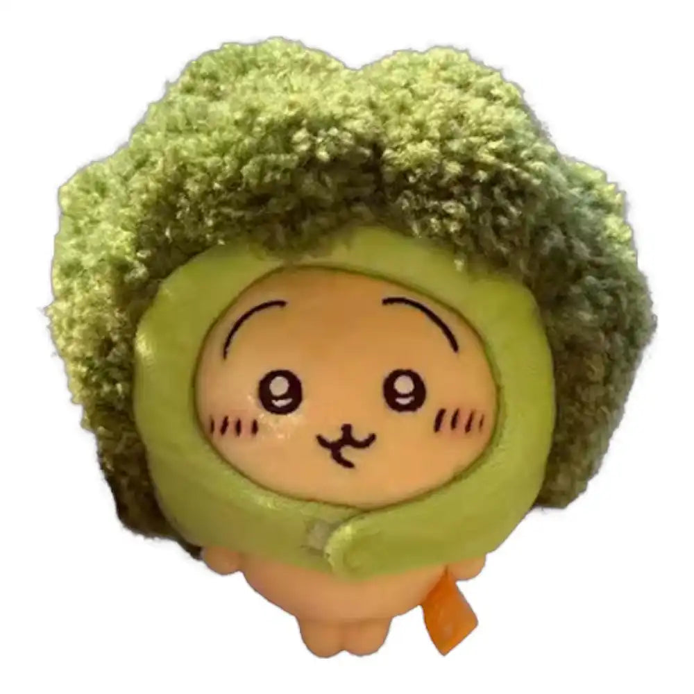 Chiikawa 10cm plush toy wearing a green, textured broccoli-shaped head cover accessory.