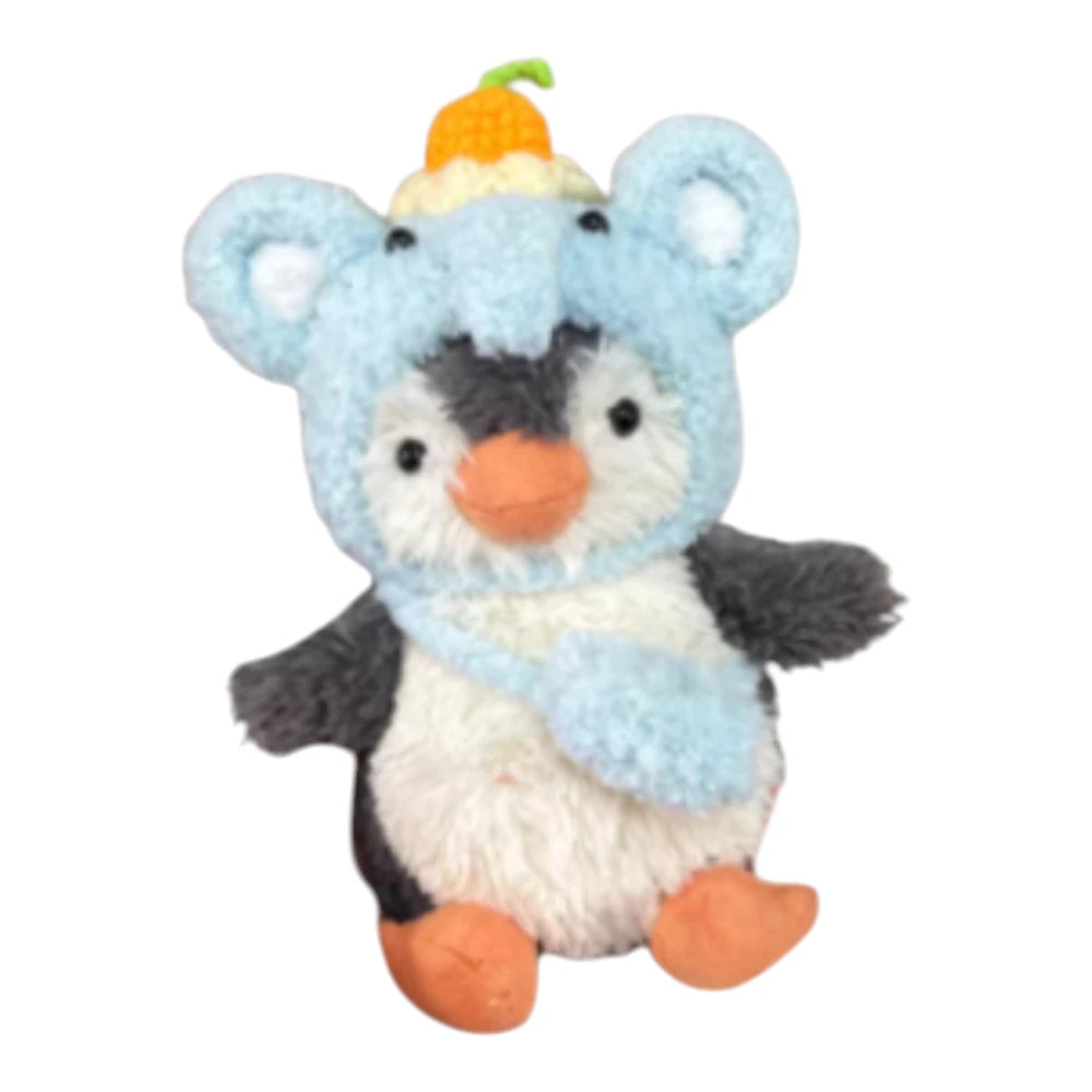 Jellycat Peanut Penguin Bag Charm wearing an elephant-themed head cover and holding a matching small bag.