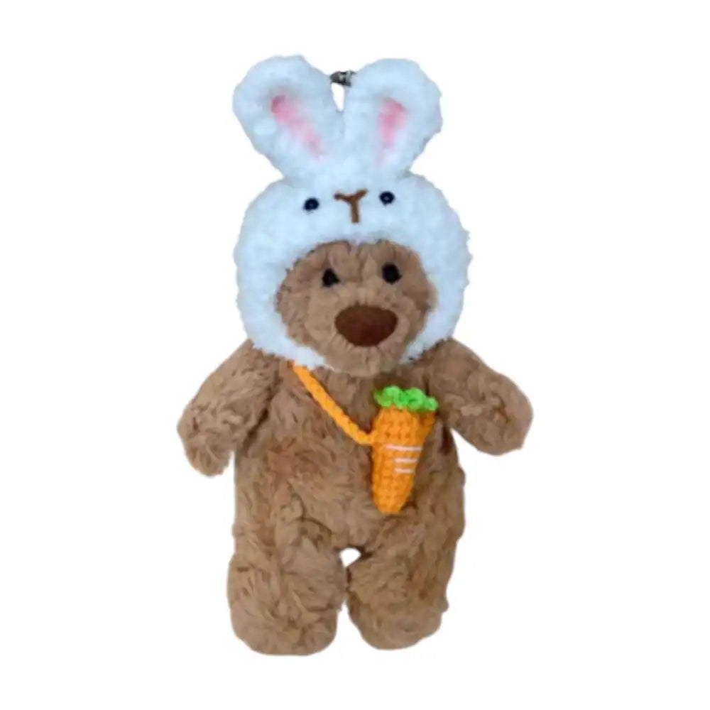 Jellycat Bartholomew Bear Bag Charm wearing a cute Rabbit headcover with long ears and holding a small matching bag.