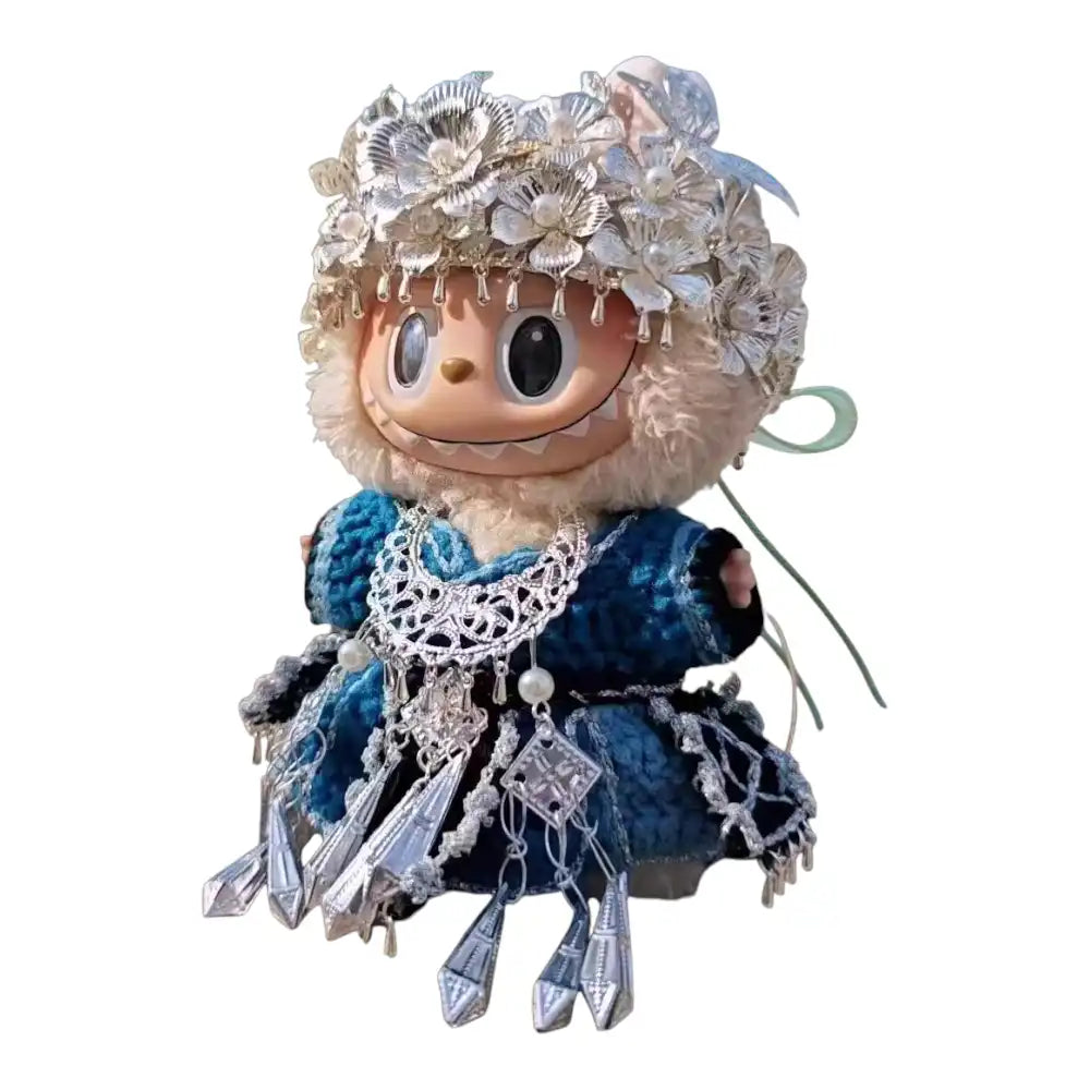 Labubu plush toy wearing a complete Hmong Attire Style Outfit, showcasing traditional garments with vibrant colors, embroidery, and silver accents.