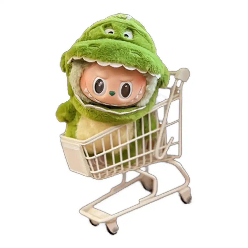 Labubu plush toy wearing the Toy Story Rex outfit, featuring a green dinosaur bodysuit with tail and a headpiece with eyes and small arms.