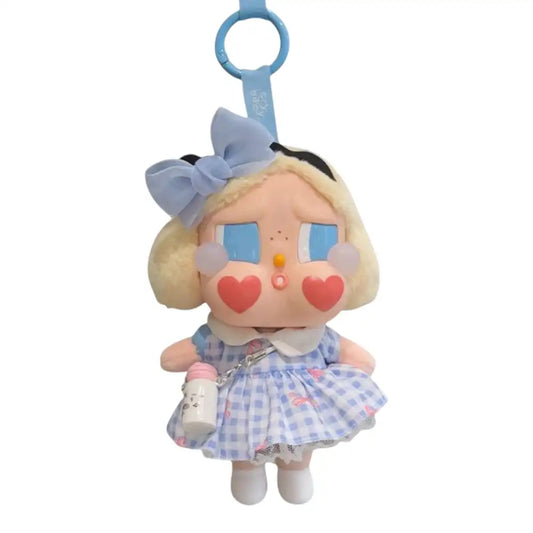 Crybaby figure wearing a 4-piece Blue Skirt Outfit set, including a layered skirt, tulle, water bottle, and bow accessory.