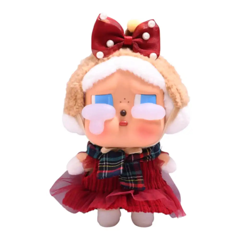 Crybaby figure wearing the Red Bow and Skirt Outfit, featuring a red tulle skirt, a plaid scarf, and a red bow headpiece.