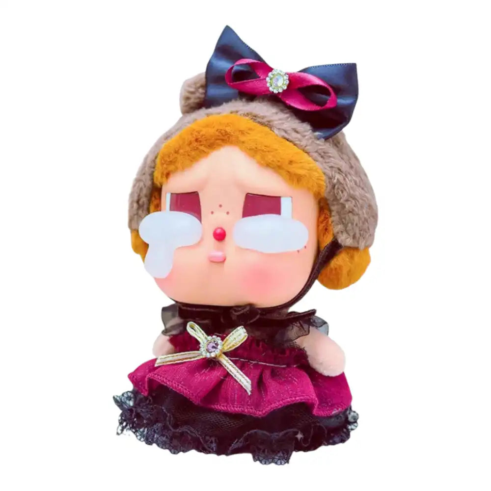 Crybaby figure wearing the Black Bow and Jewel Dress Outfit, featuring a wine-red and black lace dress with a large black bow headpiece.