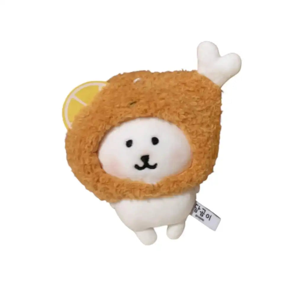 Chiikawa 10cm plush toy wearing a brown, textured lemon fried chicken-shaped head cover accessory with a yellow lemon slice.