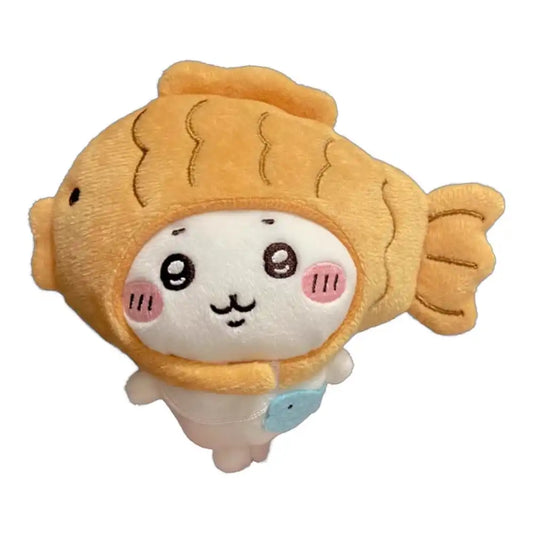 Chiikawa 10cm plush toy wearing a red and white sea bream (tai) fish-shaped head cover accessory.