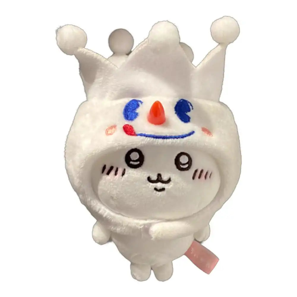 Chiikawa 10cm plush toy wearing a white snowman king-shaped head cover accessory with a crown and carrot nose.