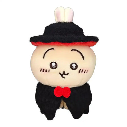 Chiikawa 10cm plush toy wearing a black vampire-themed outfit with a cape and fangs.