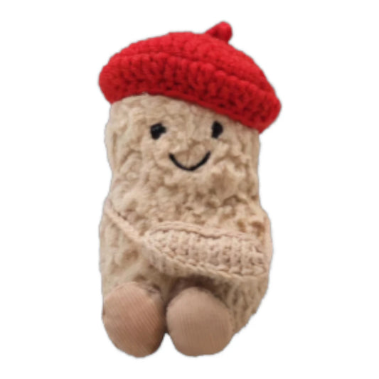 Jellycat Amuseables Peanut keychain wearing a beret head cover and holding a matching small bag.