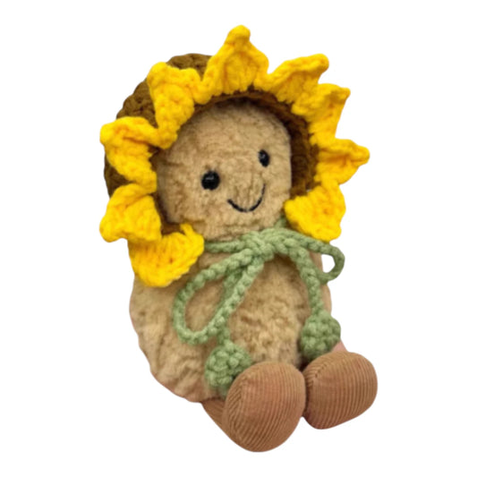 Jellycat Amuseables Peanut keychain wearing a sunflower-themed head cover.