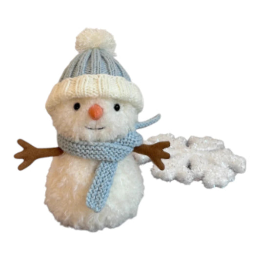 Jellycat Little Snowman plush wearing a blue bobble hat and a matching blue scarf.