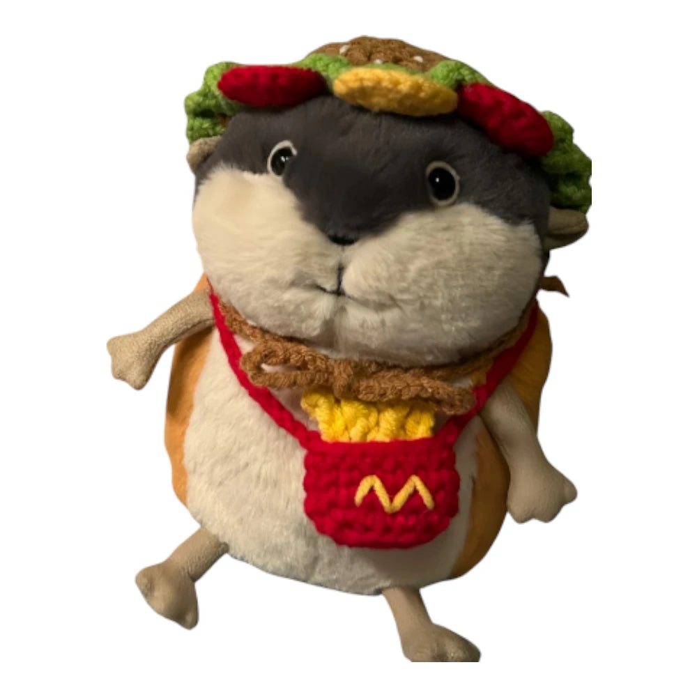 Jellycat Lambeth Lemming plush wearing a McDonald's-themed head cover and holding a matching small bag.