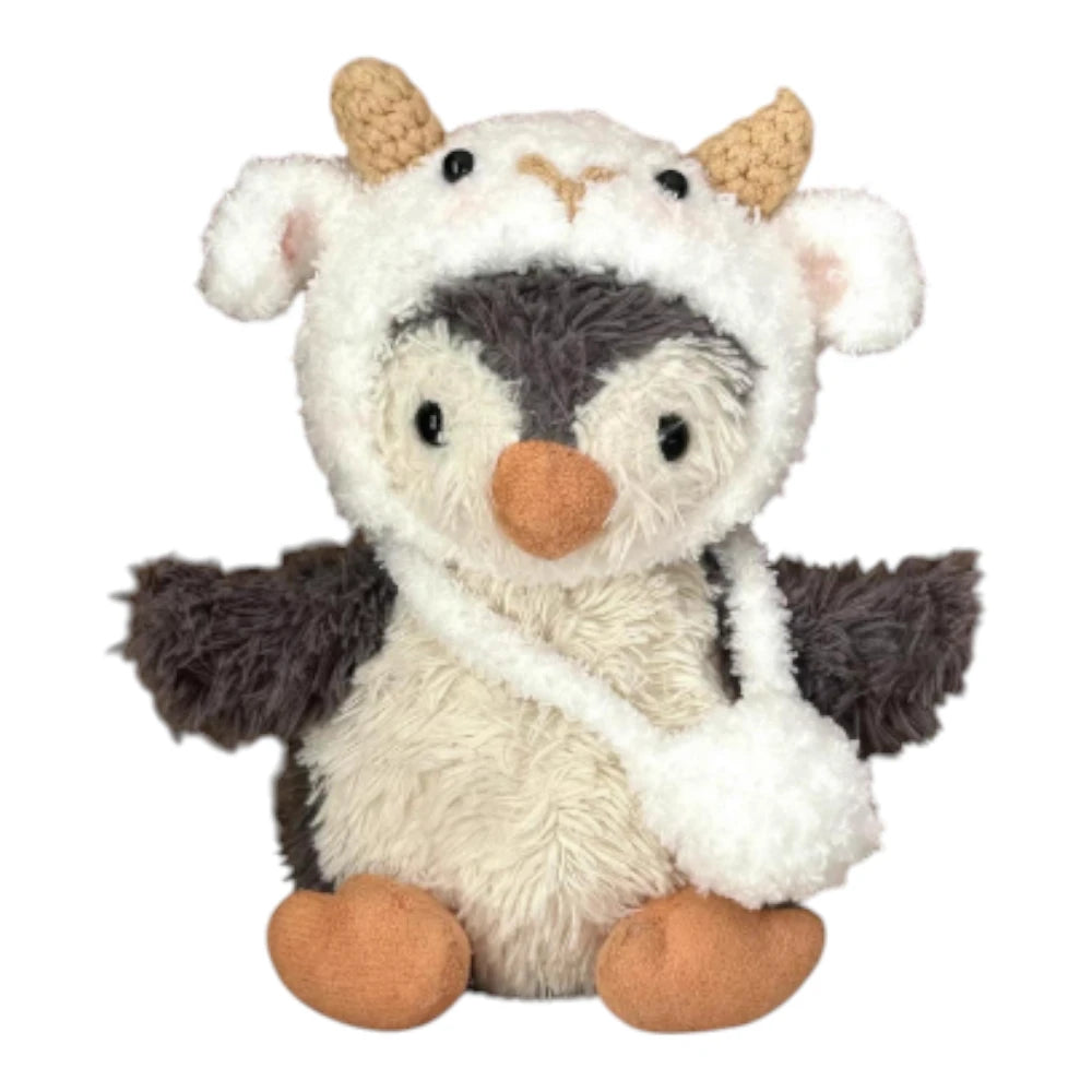 Jellycat Peanut Penguin Bag Charm wearing a sheep-themed head cover and holding a matching small bag.