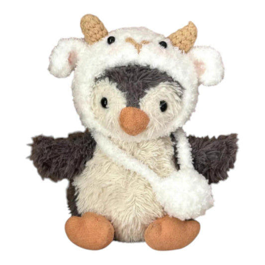 Jellycat Peanut Penguin Bag Charm wearing a sheep-themed head cover and holding a matching small bag.