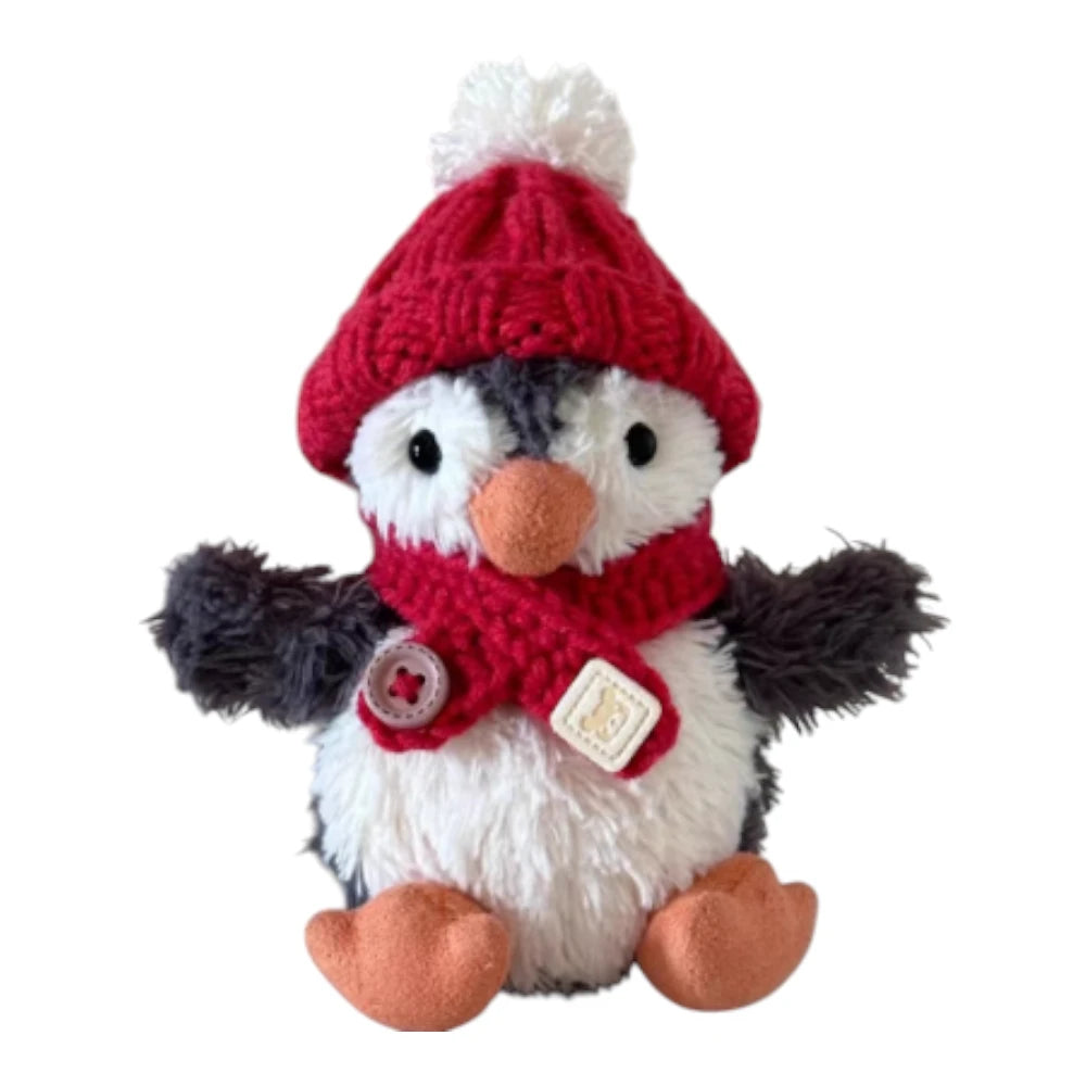 Jellycat Peanut Penguin Bag Charm wearing a bobble hat and matching scarf, available in multiple colors.