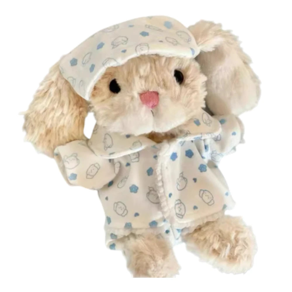 Jellycat Yummy Bunny plush wearing blue puppy-themed pajamas.
