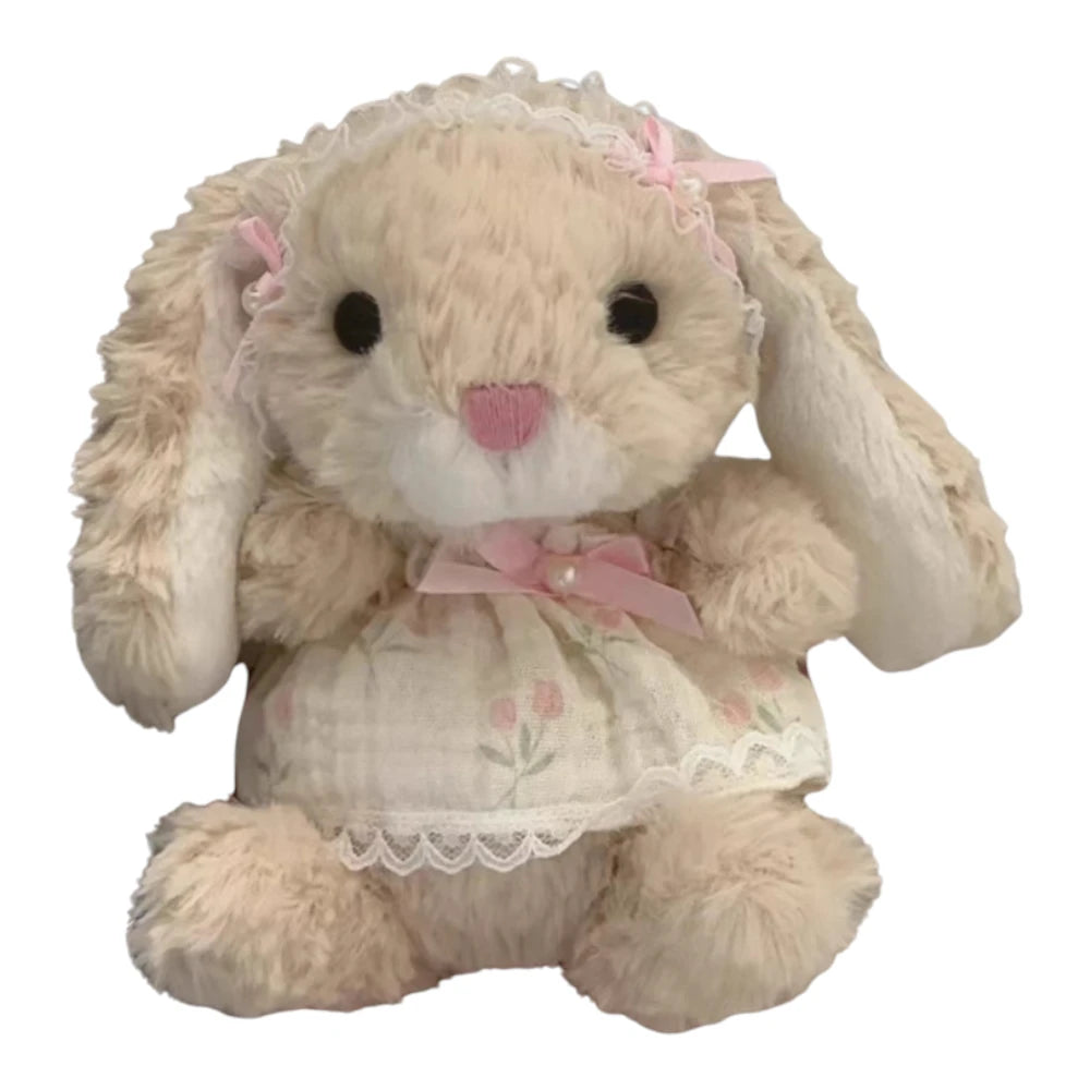 Jellycat Yummy Bunny plush wearing a tulip suspender skirt outfit and a lace headband.