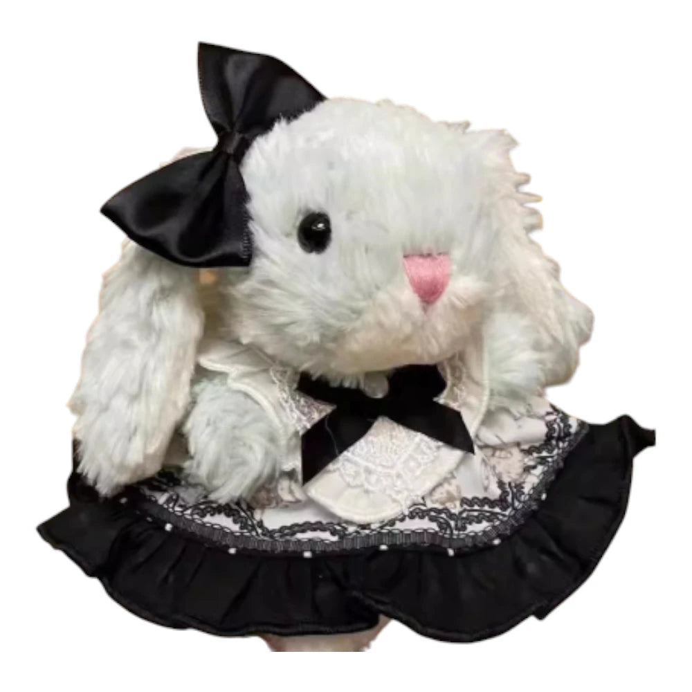 Jellycat Yummy Bunny plush wearing a nurse-themed dress and a black bow headband.