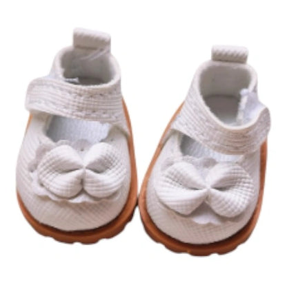 A collection of 8 pairs of miniature bow-tie shoes for Labubu, displayed in white, yellow, pink, light blue, black, light brown, red, and dark brown.