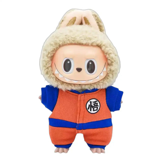 Labubu plush toy wearing the complete Dragon Ball Super Goku martial arts uniform, featuring orange gi, blue undershirt, and wristbands.
