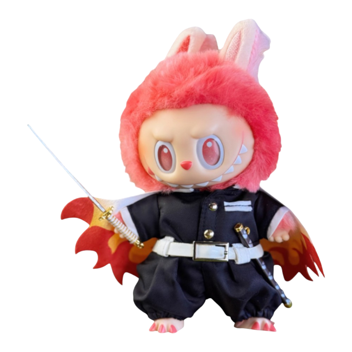 Labubu wearing a detailed Demon Slayer Kyojuro Rengoku style outfit, including a vibrant flame-patterned haori, black uniform, pants, white belt, and a miniature Nichirin sword.