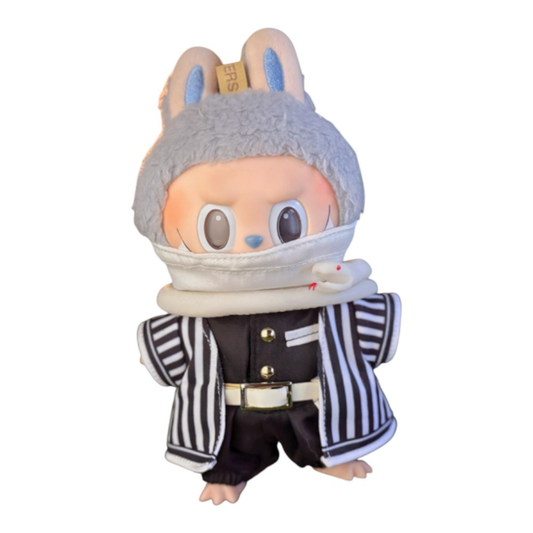 Labubu dressed in an Obanai Iguro style outfit, including a striped haori, black uniform top, pants, white belt, a face mask, and a small white snake accessory.