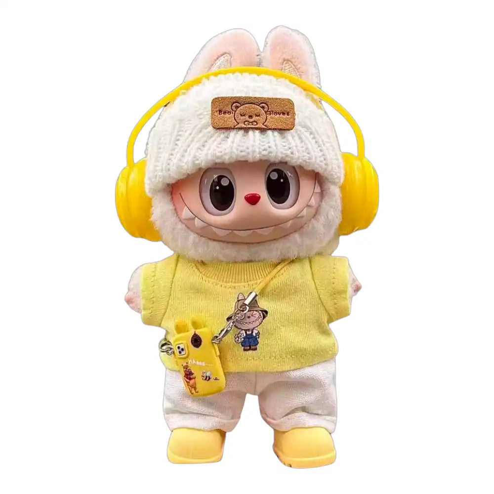 Labubu plush toy wearing a full 6-item Printed T-shirt Outfit, including headphones, hat, printed T-shirt, pants, shoes, and a miniature mobile phone, available in Yellow and Blue.