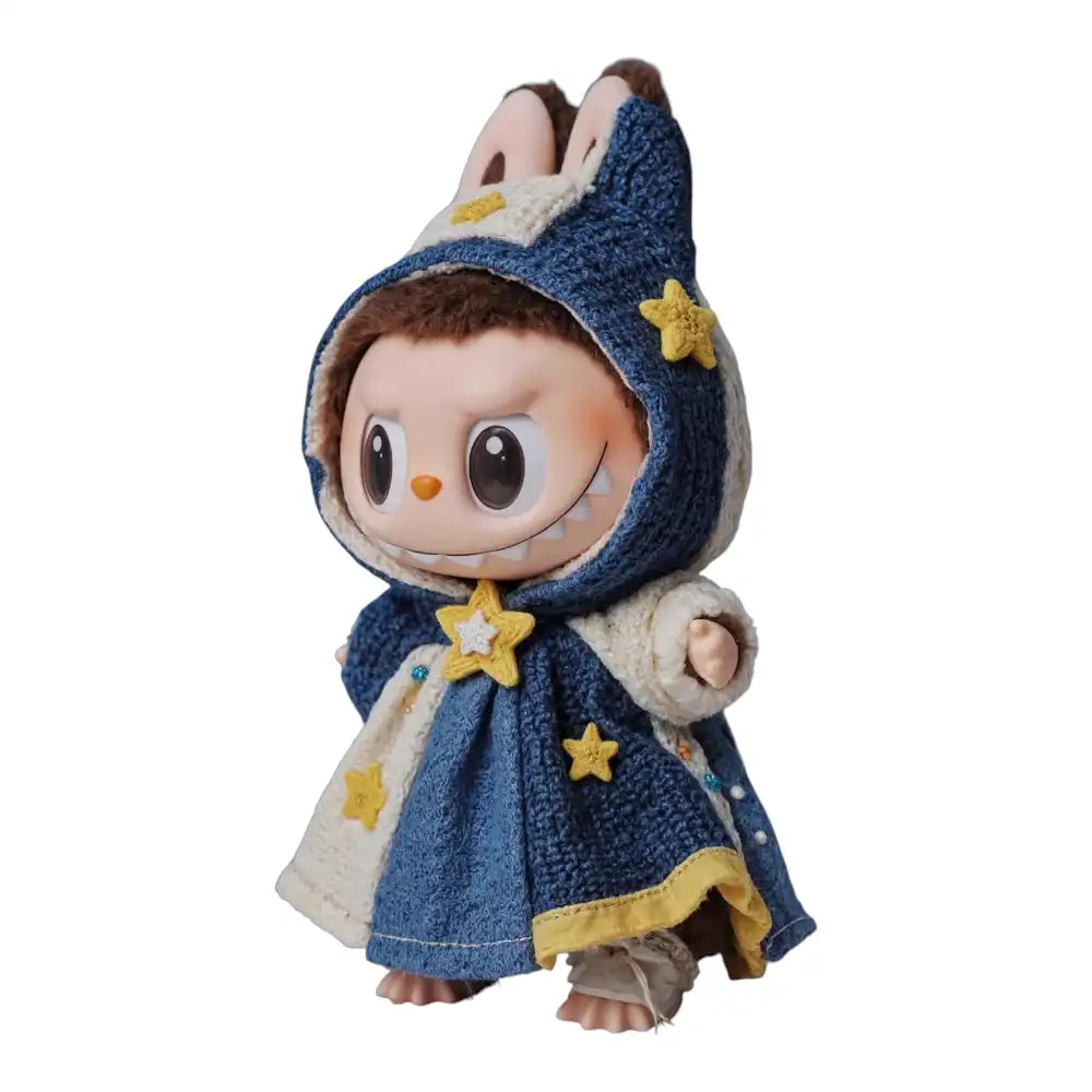 Labubu plush toy wearing a one-piece dress featuring a print inspired by Vincent van Gogh's "The Starry Night" painting.