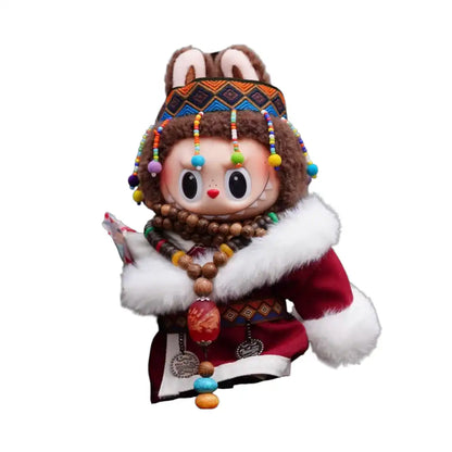 Labubu plush toy wearing a full 5-item Tibetan Style Outfit, including a two-piece garment, belt, headpiece, and necklace, available in Red and Blue.