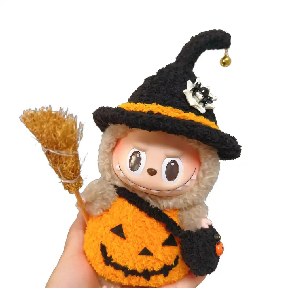 Labubu plush toy wearing a complete witch-themed outfit, perfect for Halloween, featuring a classic pointed hat and flowing robes.