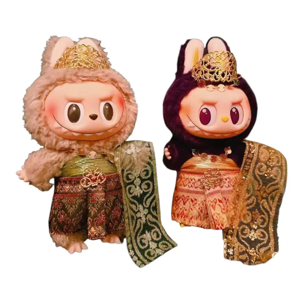 Labubu plush toy wearing a complete traditional Thai clothing outfit with a regal crown, available in red and green or yellow and red color combinations.