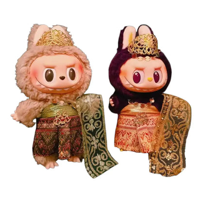 Labubu plush toy wearing a complete traditional Thai clothing outfit with a regal crown, available in red and green or yellow and red color combinations.