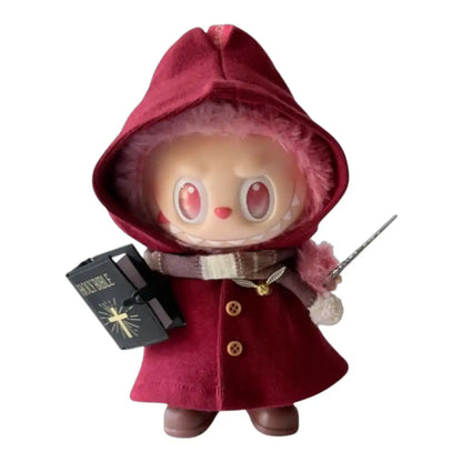 Labubu plush toy wearing a 2-piece wizard outfit, including a cloak and a scarf, available in red, blue, or yellow. The outfit does not include additional accessories.