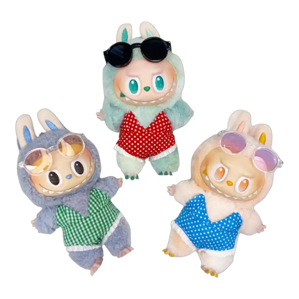 Labubu plush toy wearing a 2-piece swimsuit party outfit, including a swimsuit and sunglasses, available in red, green, or blue.