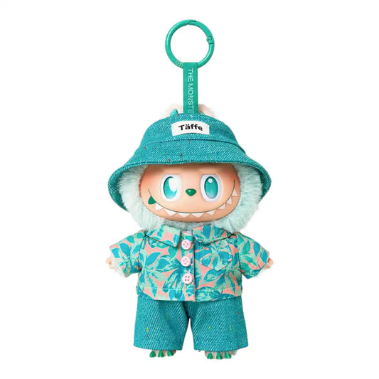 Labubu plush toy wearing a 3-piece leisure vacation shirt outfit, including a bucket hat, shirt, and jeans. Available in an all-green style or a blue hat and jeans with a floral shirt style.