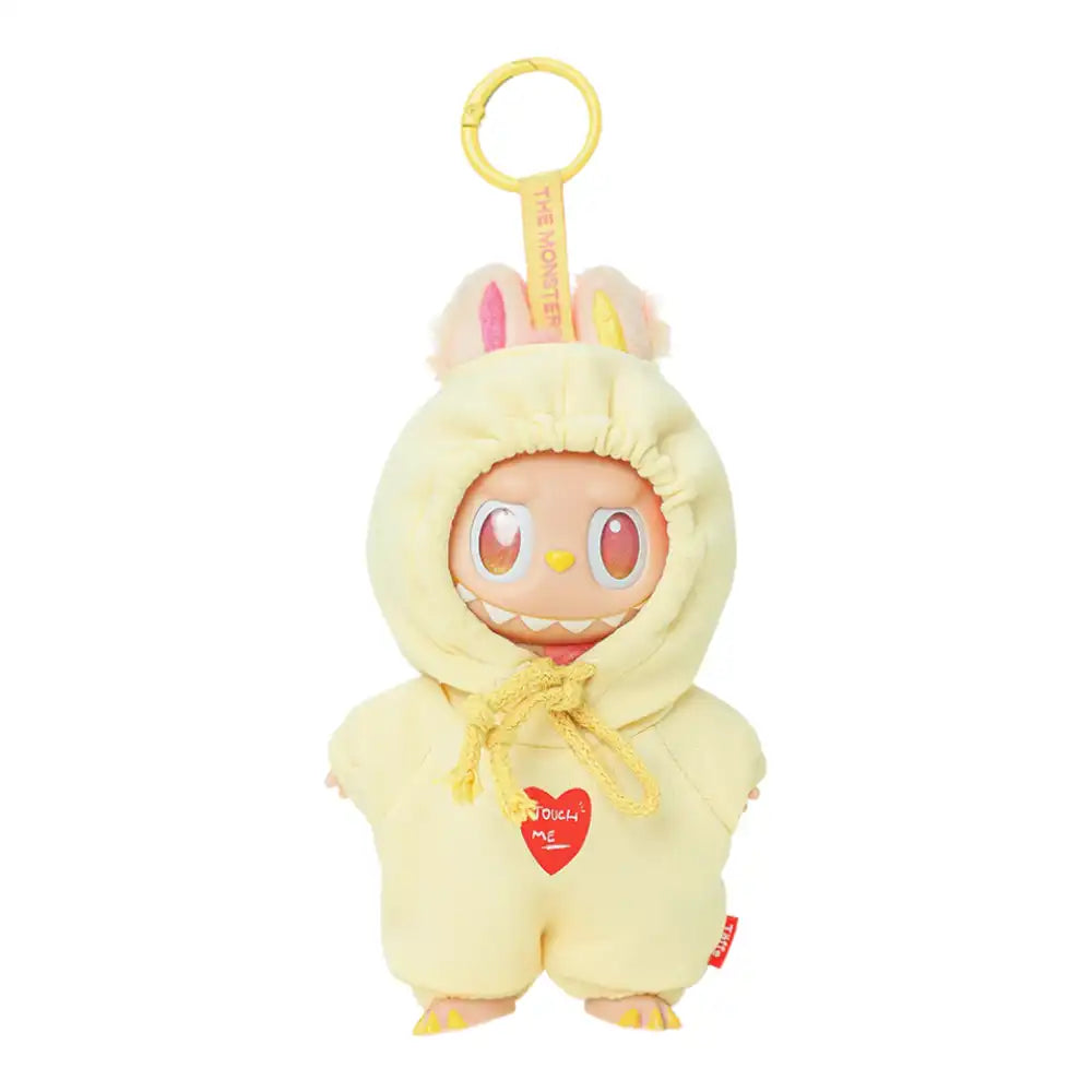 Labubu plush toy wearing a 1-piece hooded bodysuit, available in yellow, light pink, dark pink, dark grey, light grey, aqua blue, or grey.