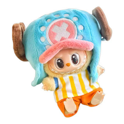Labubu plush toy wearing the complete 4-piece One Piece Tony Tony Chopper outfit, featuring pink hat, striped top, blue shorts, and medical backpack.